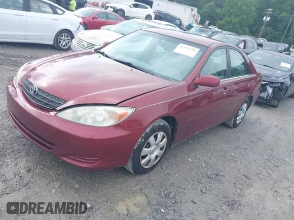 2004 Toyota Camry LE with VIN 4T1BE32KX4U293071, listed as a IAAI auction lot 42371516 with 173,000 mi miles and . Bid and sale history available at DreamBid. Image 2.