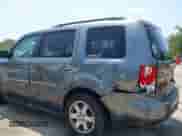 2009 Honda Pilot Touring with VIN 5FNYF48869B038009, listed as a IAAI auction lot 42390759 with 151,623 mi miles and . Bid and sale history available at DreamBid. Image 6.