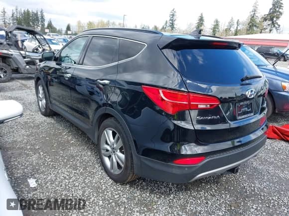 2015 Hyundai Santa Fe z VIN 5XYZWDLA2FG245029, wystawiony jako IAAI lot #42021999 z przebiegiem 135 021 mil mil oraz . Historia ofert i sprzedaży dostępna na DreamBid. Obrazek 3.
