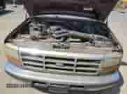 1996 Ford F-150 z VIN 1FTEX14N8TKA40297, wystawiony jako Copart lot #71630905 z przebiegiem 99 367 mil mil oraz Czysty tytuł • Clean title. Historia ofert i sprzedaży dostępna na DreamBid. Obrazek 11.