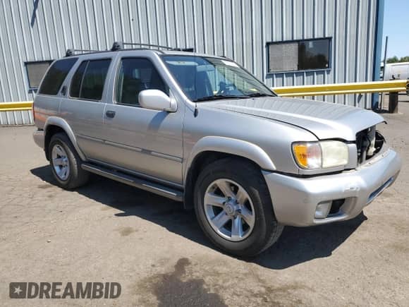 2003 Nissan Pathfinder LE with VIN JN8DR09Y93W809244, listed as a Copart auction lot 65850995 with 168,938 mi miles and Salvage title. Bid and sale history available at DreamBid. Image 4.