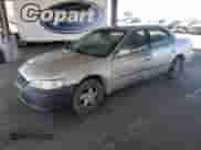 1999 Honda Accord LX z VIN JHMCG6654XC023089, wystawiony jako Copart lot #69421625 z przebiegiem 259 495 mil mil oraz Szkoda całkowita • Salvage title. Historia ofert i sprzedaży dostępna na DreamBid. Obrazek 1.