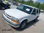 2000 Chevrolet Blazer LS z VIN 1GNCS13W2Y2206599, wystawiony jako IAAI lot #42728429 z przebiegiem 153 219 mil mil oraz . Historia ofert i sprzedaży dostępna na DreamBid. Obrazek 17.