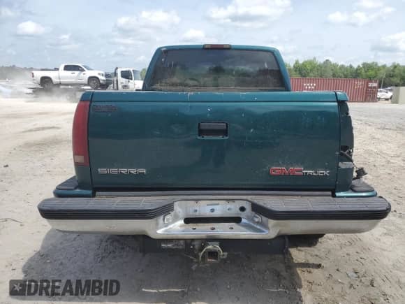 1997 GMC Sierra 1500 z VIN 2GTEC19R4V1506513, wystawiony jako Copart lot #55646355 z przebiegiem Nie podano mil oraz Czysty tytuł • Clean title. Historia ofert i sprzedaży dostępna na DreamBid. Obrazek 6.