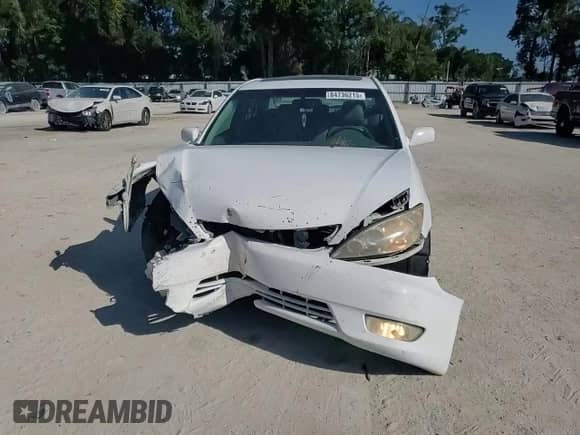 2006 Toyota Camry XLE с VIN 4T1BF32K76U634300, выставлен на аукционе Copart как лот 84736215 с пробегом 175 792 миль миль и Списание • Salvage title. История ставок и продаж доступна на DreamBid. Изображение 13.