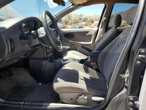 2001 Saturn SL with VIN 1G8ZK52731Z237050, listed as a Copart auction lot 60977394 with Not provided miles and Salvage title. Bid and sale history available at DreamBid. Image 7.