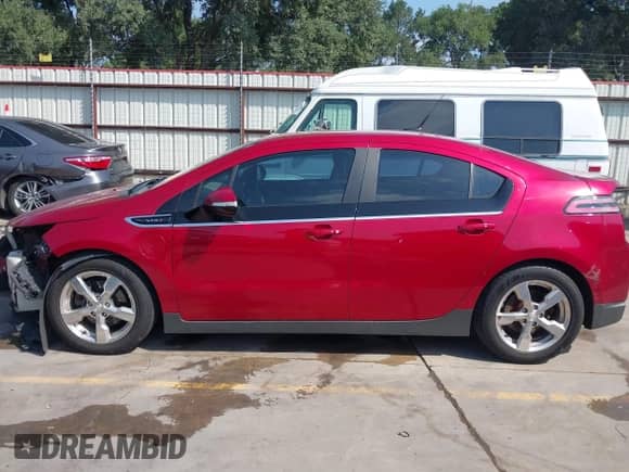 2014 Chevrolet Volt z VIN 1G1RD6E47EU144728, wystawiony jako IAAI lot #42295923 z przebiegiem 236 921 mil mil oraz . Historia ofert i sprzedaży dostępna na DreamBid. Obrazek 15.