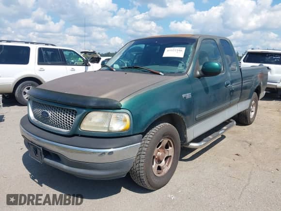 1999 Ford F-150 с VIN 2FTZX1722XCA35478, выставлен на аукционе IAAI как лот 43322186 с пробегом 99 975 миль миль и . История ставок и продаж доступна на DreamBid. Изображение 17.