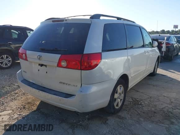 2009 Toyota Sienna XLE with VIN 5TDZK22CX9S232491, listed as a IAAI auction lot 43389674 with 298,733 mi miles and . Bid and sale history available at DreamBid. Image 4.