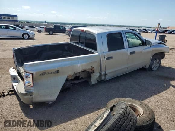 2006 Dodge Dakota SLT with VIN 1D7HW48N36S666605, listed as a Copart auction lot 63106415 with 177,831 mi miles and Salvage title. Bid and sale history available at DreamBid. Image 3.