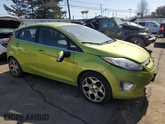 2012 Ford Fiesta SES с VIN 3FADP4FJ8CM128613, выставлен на аукционе Copart как лот 47583485 с пробегом 125 455 миль миль и Списание • Salvage title. История ставок и продаж доступна на DreamBid. Изображение 4.