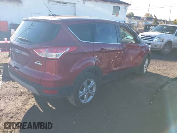 2014 Ford Escape SE with VIN 1FMCU0GX6EUC18010, listed as a IAAI auction lot 43536627 with 76,418 mi miles and . Bid and sale history available at DreamBid. Image 4.