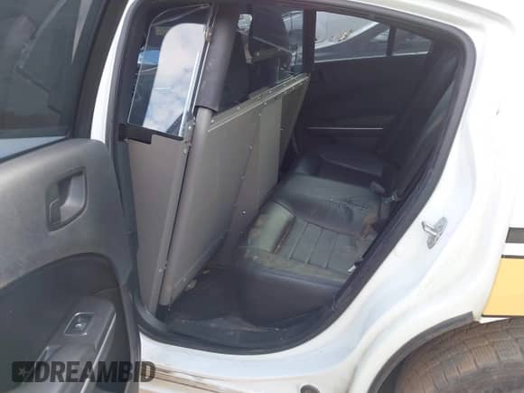 2021 Dodge Charger Police with VIN 2C3CDXATXMH663181, listed as a IAAI auction lot 43233928 with 82,341 mi miles and . Bid and sale history available at DreamBid. Image 8.