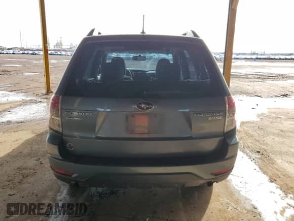 2013 Subaru Forester X с VIN JF2SHABC4DH412509, выставлен на аукционе Copart как лот 82421415 с пробегом 123 907 миль миль и Списание • Salvage title. История ставок и продаж доступна на DreamBid. Изображение 6.