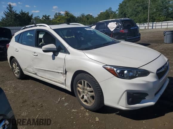 2017 Subaru Impreza Premium with VIN 4S3GTAD61H3729306, listed as a Copart auction lot 80734975 with 132,659 mi miles and Salvage title. Bid and sale history available at DreamBid. Image 4.