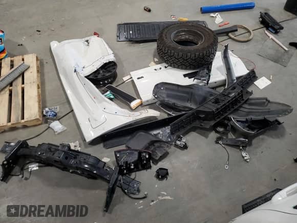 2023 Toyota Tacoma SR5 with VIN 3TYAZ5CN2PT042244, listed as a Copart auction lot 76022534 with 9,551 mi miles and Salvage title. Bid and sale history available at DreamBid. Image 12.