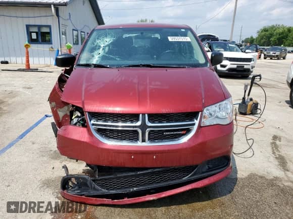 2016 Dodge Grand Caravan SE z VIN 2C4RDGBG4GR243650, wystawiony jako Copart lot #59537515 z przebiegiem 83 559 mil mil oraz Szkoda całkowita • Salvage title. Historia ofert i sprzedaży dostępna na DreamBid. Obrazek 5.