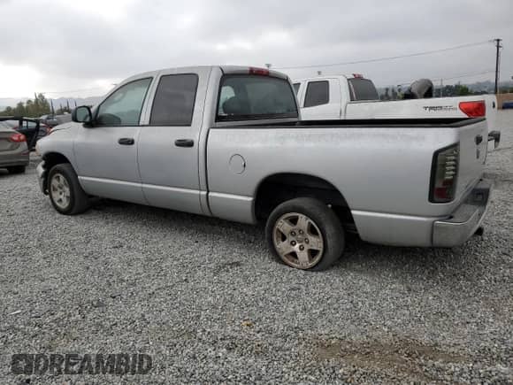 2005 Dodge 1500 SLT with VIN 1D7HA18D05J570908, listed as a Copart auction lot 67644575 with 169,296 mi miles and Salvage title. Bid and sale history available at DreamBid. Image 2.