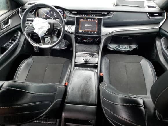 2023 Jeep Grand Cherokee Altitude with VIN 1C4RJGAG1PC557243, listed as a Copart auction lot 67358645 with 20,488 mi miles and Salvage title. Bid and sale history available at DreamBid. Image 8.