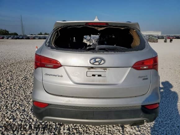 2014 Hyundai Santa Fe с VIN 5XYZUDLB8EG143232, выставлен на аукционе Copart как лот 80830075 с пробегом Не указан миль и На запчасти • Non repairable. История ставок и продаж доступна на DreamBid. Изображение 6.