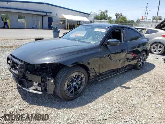 2022 BMW i4 eDrive40 with VIN WBY73AW05NFN10284, listed as a Copart auction lot 57851335 with 22,431 mi miles and Salvage title. Bid and sale history available at DreamBid. Image 1.