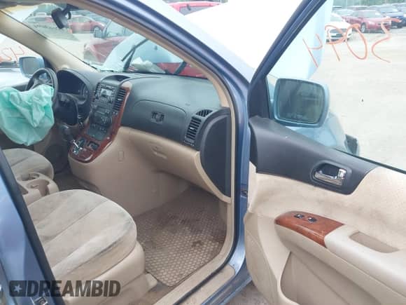 2007 Hyundai Entourage GLS with VIN KNDMC233676013319, listed as a IAAI auction lot 42663094 with 209,578 mi miles and . Bid and sale history available at DreamBid. Image 5.