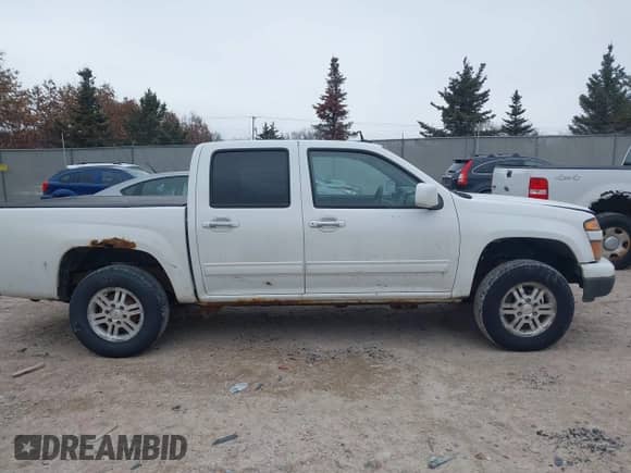 2012 Chevrolet Colorado 1LT с VIN 1GCHTCFEXC8144451, выставлен на аукционе IAAI как лот 41394551 с пробегом 204 208 миль миль и . История ставок и продаж доступна на DreamBid. Изображение 13.