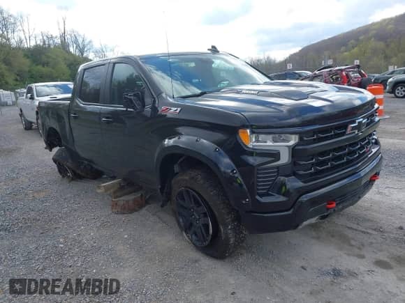 2023 Chevrolet Silverado 1500 LT Trail Boss z VIN 3GCUDFE89PG270678, wystawiony jako IAAI lot #42028188 z przebiegiem 46 820 mil mil oraz . Historia ofert i sprzedaży dostępna na DreamBid. Obrazek 1.