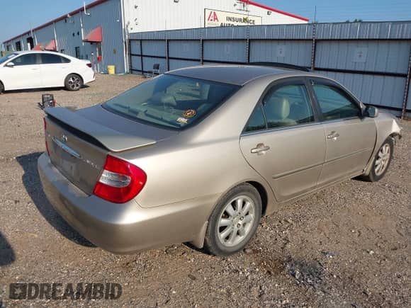 2002 Toyota Camry XLE с VIN JTDBF32K520012087, выставлен на аукционе IAAI как лот 43166714 с пробегом 111 936 миль миль и . История ставок и продаж доступна на DreamBid. Изображение 4.