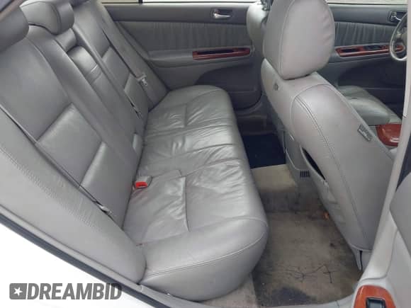 2005 Toyota Camry LE with VIN 4T1BF30K05U085637, listed as a IAAI auction lot 42912566 with 230,456 mi miles and . Bid and sale history available at DreamBid. Image 8.