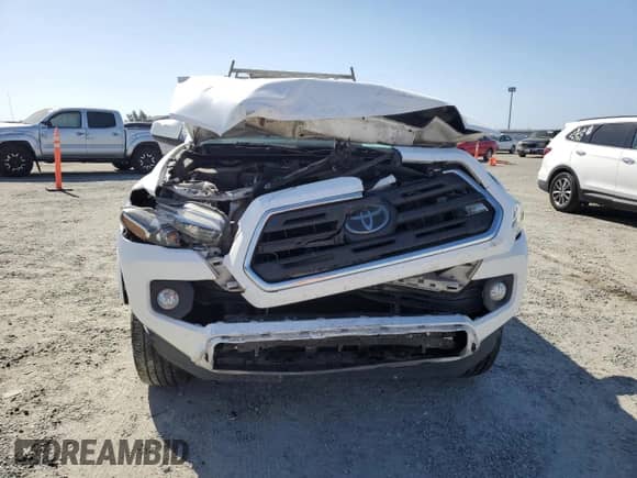 2018 Toyota Tacoma SR5 с VIN 3TMBZ5DN7JM012484, выставлен на аукционе Copart как лот 60505065 с пробегом 290 718 миль миль и Списание • Salvage title. История ставок и продаж доступна на DreamBid. Изображение 5.