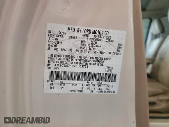 2007 Mercury Mariner Premier with VIN 4M2CU97107KJ05778, listed as a Copart auction lot 60433475 with 218,344 mi miles and Salvage title. Bid and sale history available at DreamBid. Image 13.