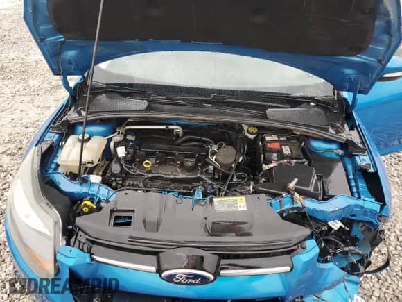 2013 Ford Focus Titanium z VIN 1FADP3N21DL194721, wystawiony jako Copart lot #59067415 z przebiegiem 153 071 mil mil oraz Szkoda całkowita • Salvage title. Historia ofert i sprzedaży dostępna na DreamBid. Obrazek 11.