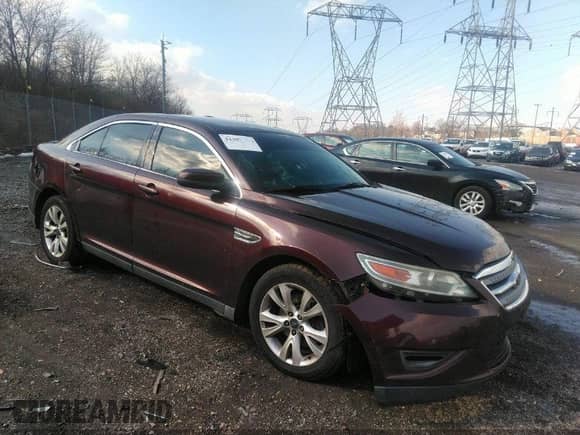 2010 Ford Taurus SEL with VIN 1FAHP2HW8AG135647, listed as a IAAI auction lot 40687874 with 101,000 mi miles and . Bid and sale history available at DreamBid. Image 1.