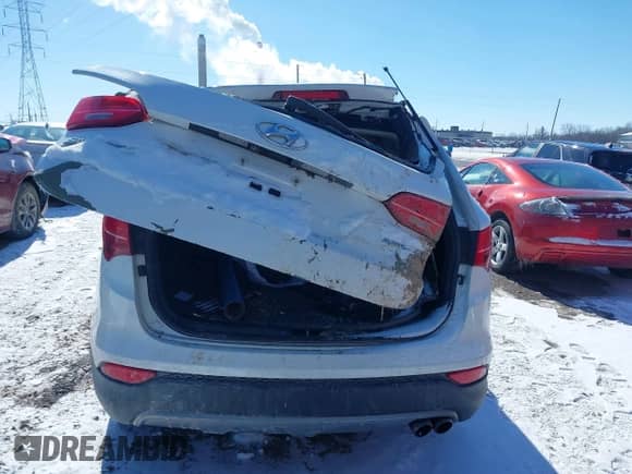 2014 Hyundai Santa Fe z VIN 5XYZUDLA6EG198589, wystawiony jako IAAI lot #41627953 z przebiegiem 155 556 mil mil oraz . Historia ofert i sprzedaży dostępna na DreamBid. Obrazek 15.