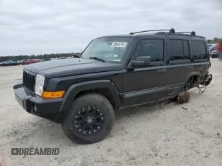 2006 Jeep Commander with VIN 1J8HH48N06C324424, listed as a Copart auction lot 89406105 with 207,170 mi miles and Salvage title. Bid and sale history available at DreamBid. Image 1.