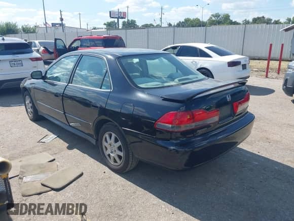 2002 Honda Accord SE z VIN 1HGCG66852A034121, wystawiony jako IAAI lot #42820792 z przebiegiem 220 120 mil mil oraz . Historia ofert i sprzedaży dostępna na DreamBid. Obrazek 3.