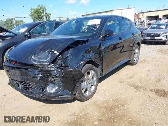 2024 Dodge Hornet R/T with VIN ZACPDFCW6R3A31144, listed as a IAAI auction lot 43084246 with 38,328 mi miles and . Bid and sale history available at DreamBid. Image 2.
