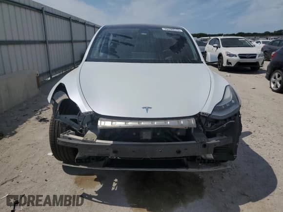 2020 Tesla Model Y Long Range with VIN 5YJYGDEE5LF034967, listed as a Copart auction lot 70299515 with Not provided miles and Salvage title. Bid and sale history available at DreamBid. Image 5.
