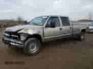 2000 Chevrolet Silverado 3500 с VIN 1GCHK33F9YF501489, выставлен на аукционе Copart как лот 81451524 с пробегом 206 504 миль миль и Списание • Salvage title. История ставок и продаж доступна на DreamBid. Изображение 1.