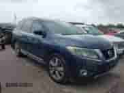 2014 Nissan Pathfinder Platinum Hybrid with VIN 5N1CR2MM2EC661154, listed as a IAAI auction lot 42629726 with 166,864 mi miles and . Bid and sale history available at DreamBid. Image 1.