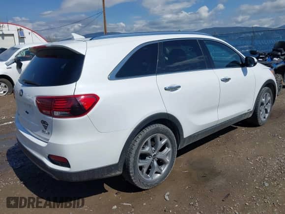 2019 Kia Sorento EX z VIN 5XYPHDA59KG606743, wystawiony jako IAAI lot #42110881 z przebiegiem 98 614 mil mil oraz . Historia ofert i sprzedaży dostępna na DreamBid. Obrazek 4.