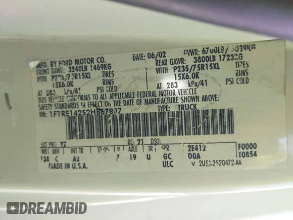 2002 Ford Econoline Cargo with VIN 1FTRE14252HB67887, listed as a IAAI auction lot 41180872 with 274,561 mi miles and . Bid and sale history available at DreamBid. Image 9.