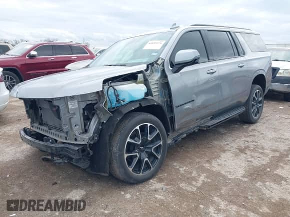2023 Chevrolet Suburban RST with VIN 1GNSKEKD7PR329839, listed as a IAAI auction lot 41899376 with 47,444 mi miles and . Bid and sale history available at DreamBid. Image 2.