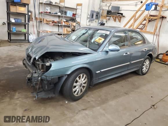 2005 Hyundai Sonata GLS with VIN KMHWF35H55A111195, listed as a Copart auction lot 69122385 with 165,186 mi miles and Salvage title. Bid and sale history available at DreamBid. Image 1.