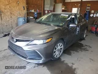 2021 Toyota Camry LE with VIN 4T1C11AK6MU573799, listed as a Copart auction lot 84624925 with 144,162 mi miles and Salvage title. Bid and sale history available at DreamBid. Image 1.