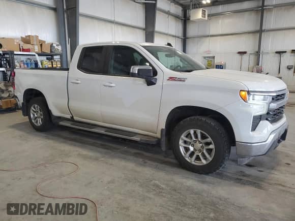 2023 Chevrolet Silverado 1500 LT with VIN 1GCRDDED3PZ117463, listed as a Copart auction lot 69764785 with 51,651 mi miles and Salvage title. Bid and sale history available at DreamBid. Image 4.