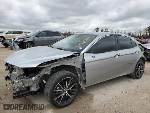 2023 Toyota Camry SE with VIN 4T1G11AK4PU809954, listed as a Copart auction lot 71636965 with 12,236 mi miles and Salvage title. Bid and sale history available at DreamBid. Image 1.