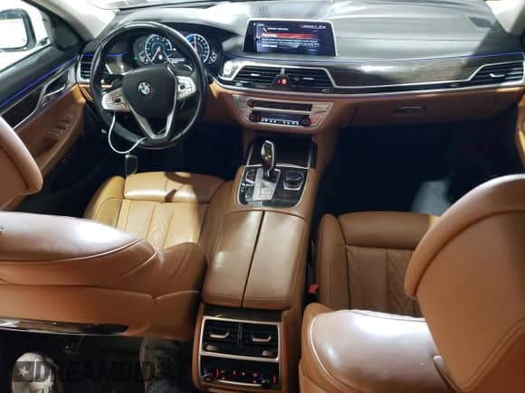 2017 BMW 7 Series 740e xDrive with VIN WBA7J2C38HG497960, listed as a Copart auction lot 58901035 with 128,262 mi miles and Salvage title. Bid and sale history available at DreamBid. Image 8.