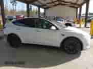 2021 Tesla Model Y Long Range with VIN 5YJYGDEE6MF138868, listed as a IAAI auction lot 43401839 with 134,786 mi miles and . Bid and sale history available at DreamBid. Image 14.